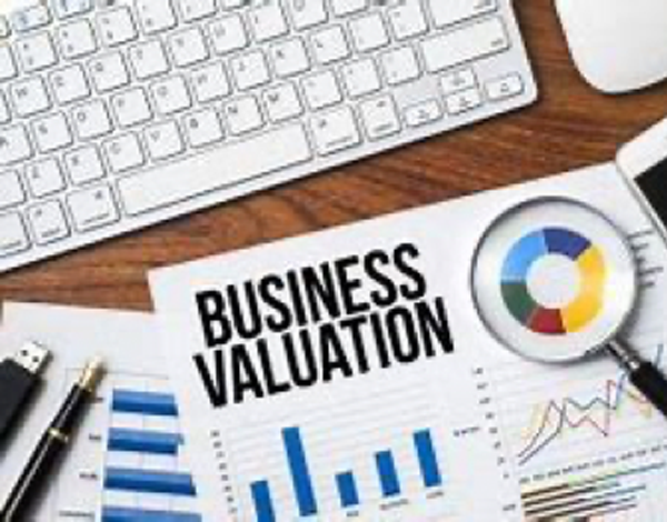 A business valuation document on top of a desk.